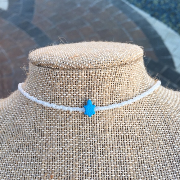 Brandy Melville Jewelry - White beaded choker with blue turtle